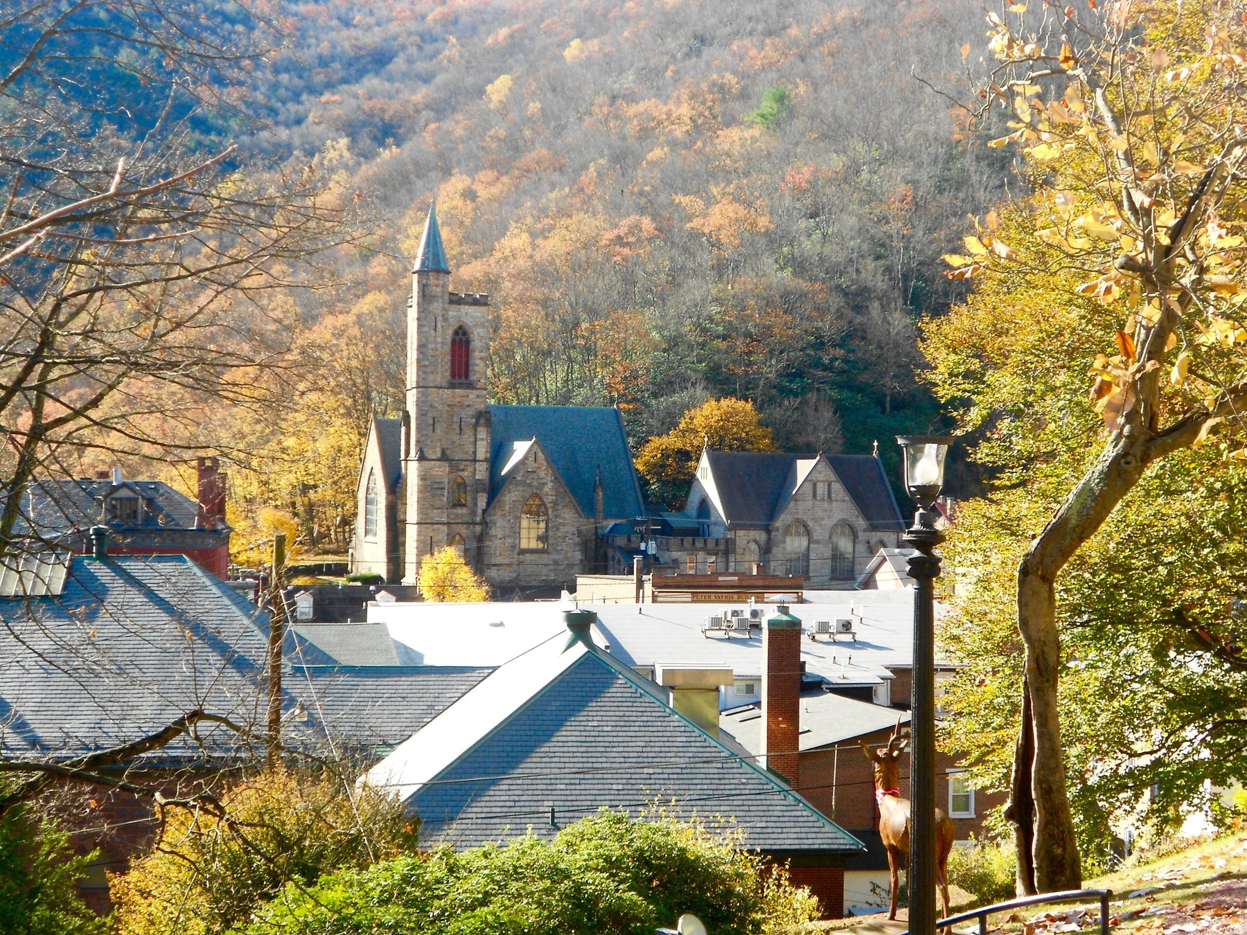 St. Mark's Church rising over the rooftops of Jim Thorpe in fall color