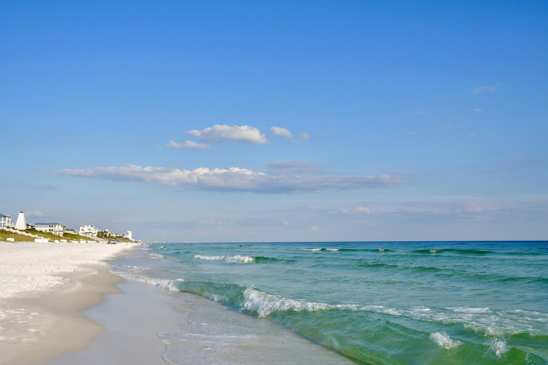 White sand and emerald water along the beach at Seaside, Florida